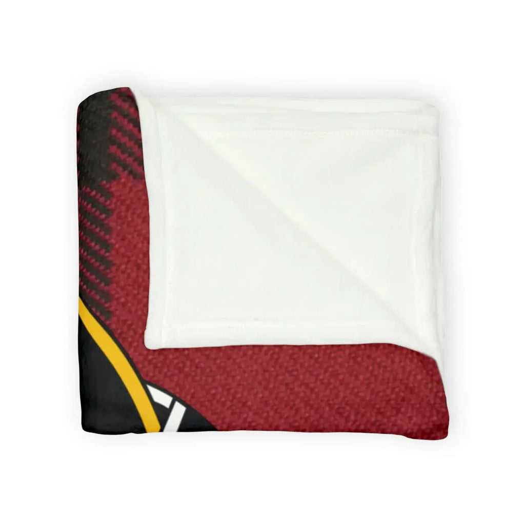 Clan Wallace tartan throw blanket on a sofa — soft printed plaid with clan crest