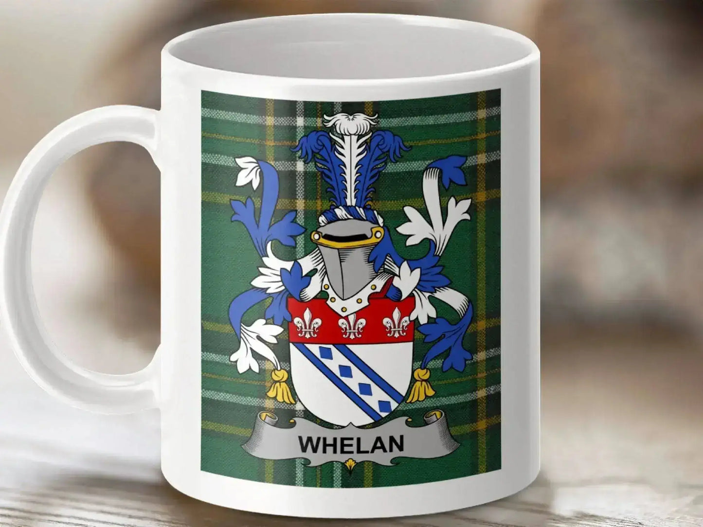 White ceramic mug with Whelan family crest and green tartan background