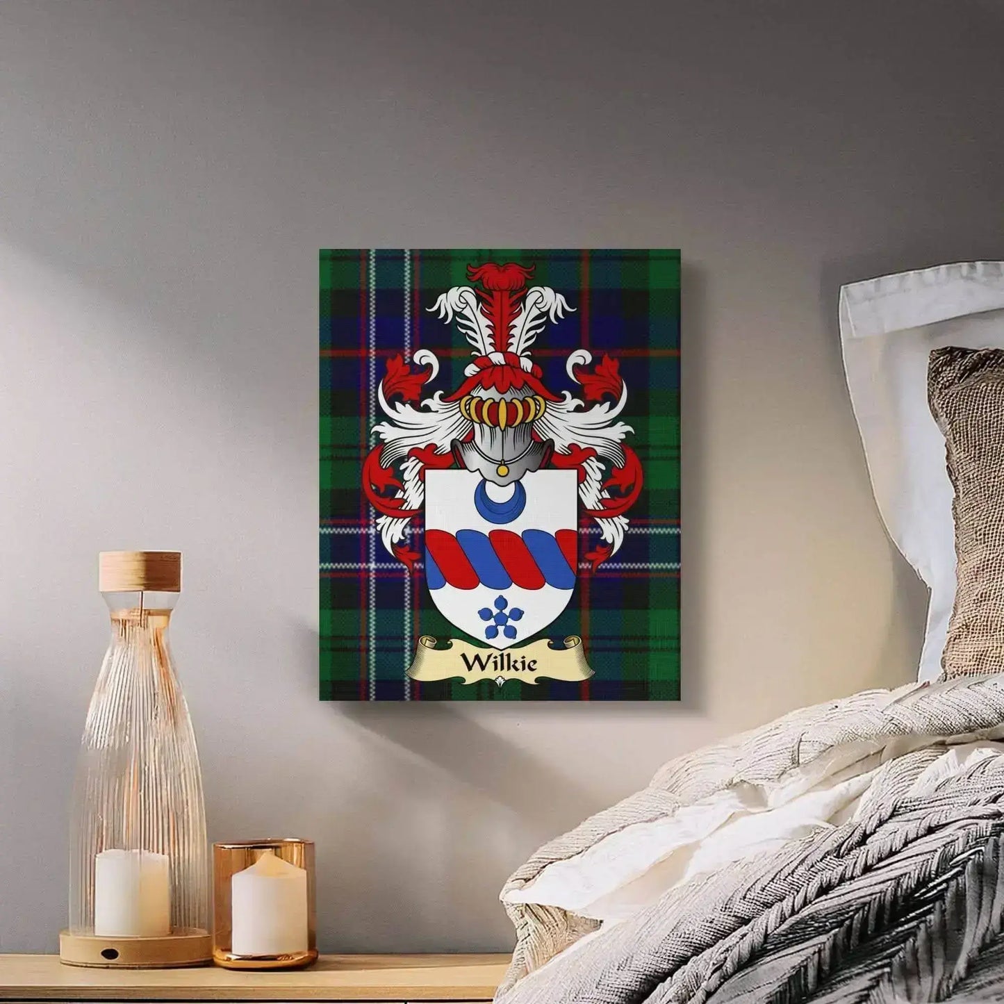 Wilkie clan coat of arms with red and blue heraldic shield on green tartan canvas wrap above bed