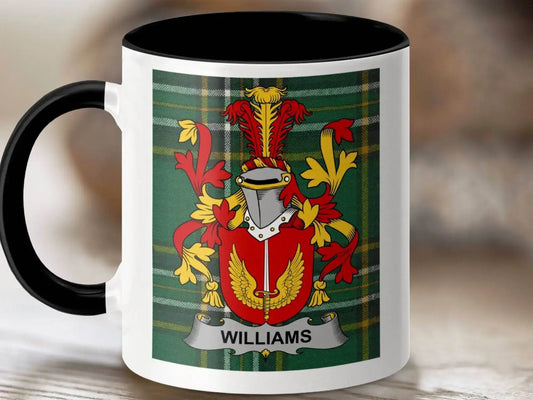 White mug with black handle featuring Williams family crest on green tartan background