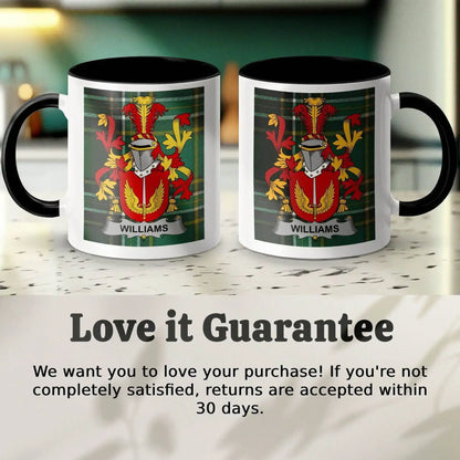 Two white mugs with black handles featuring a red and yellow Williams family crest on green plaid background