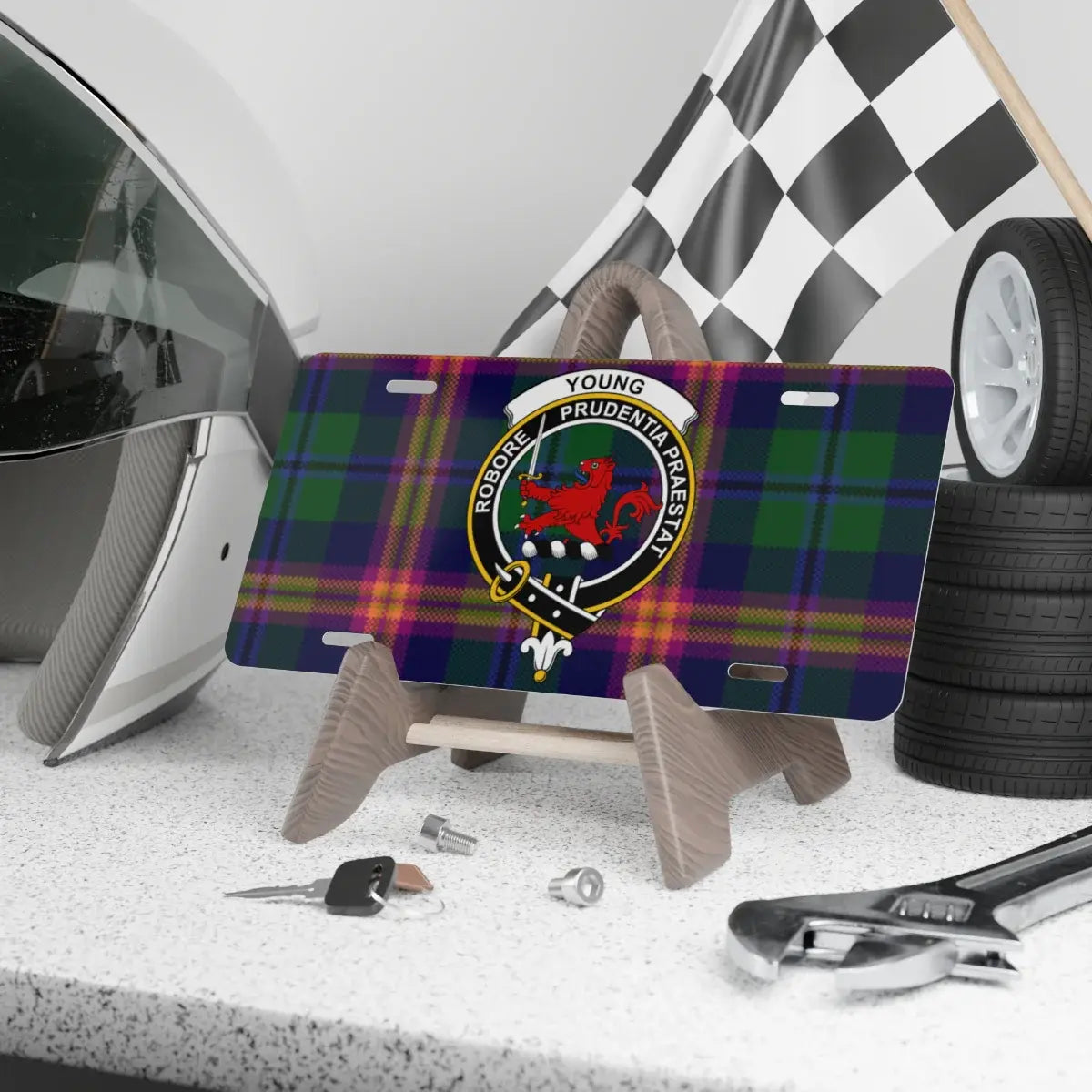 Young clan crest novelty license plate with motto on a tartan background, 12 x 6