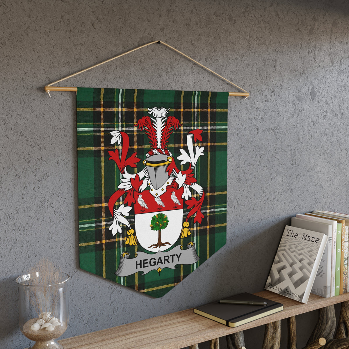 Hegarty family crest on a tartan pennant hanging on a wall.