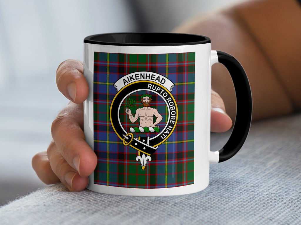 Aikenhead Scottish family crest artwork on an 11 oz black accent mug with a tartan background