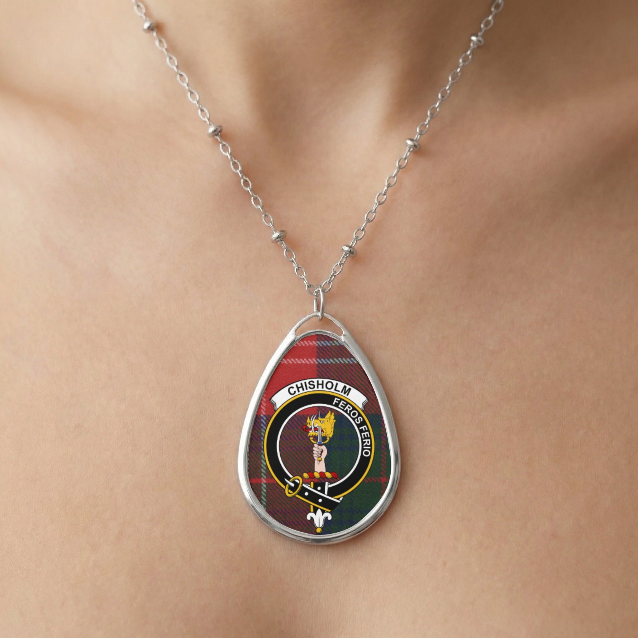 Close-up of Chisholm clan tartan pendant necklace with crest design