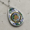 Tartan oval pendant necklace with Mackenzie crest: "Luceo Non Uro".