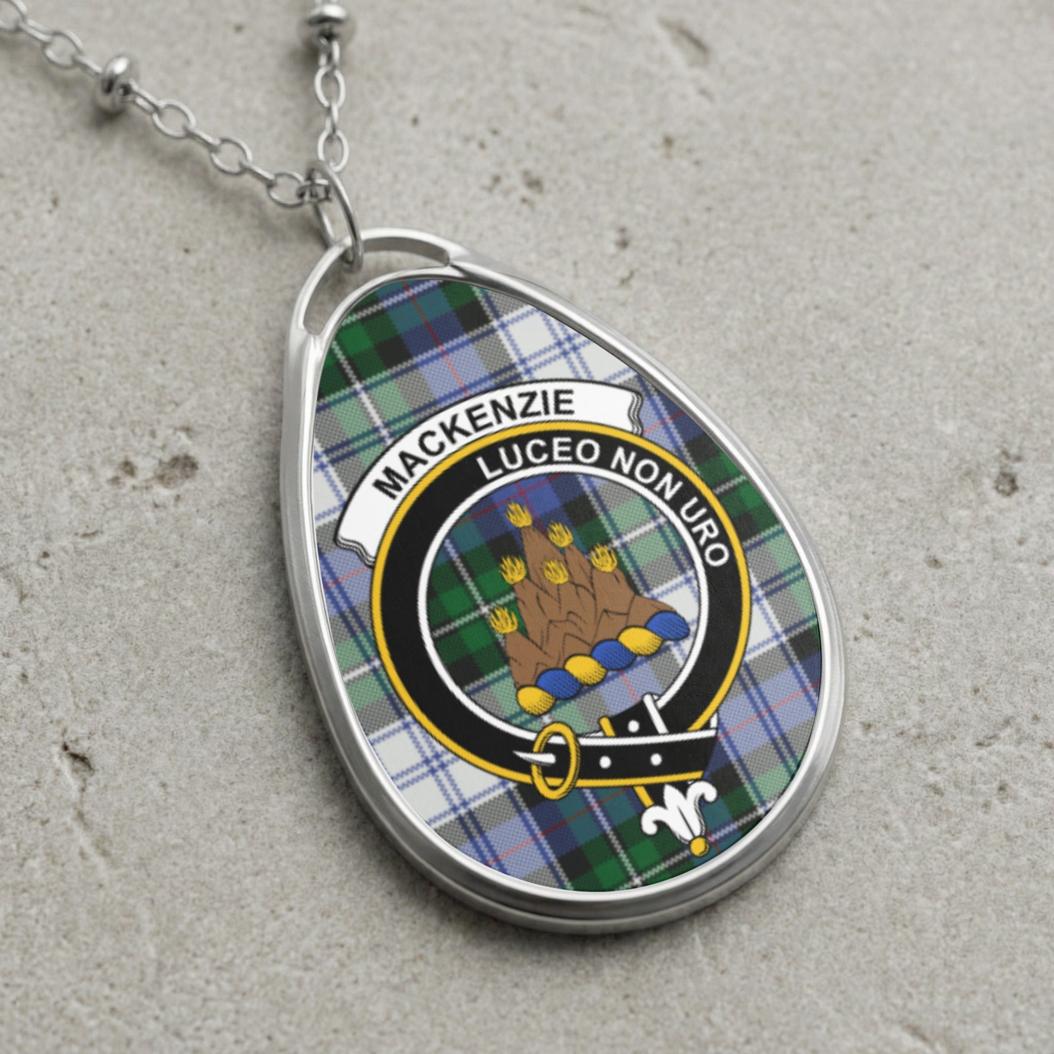 Tartan oval pendant necklace with Mackenzie crest: "Luceo Non Uro".