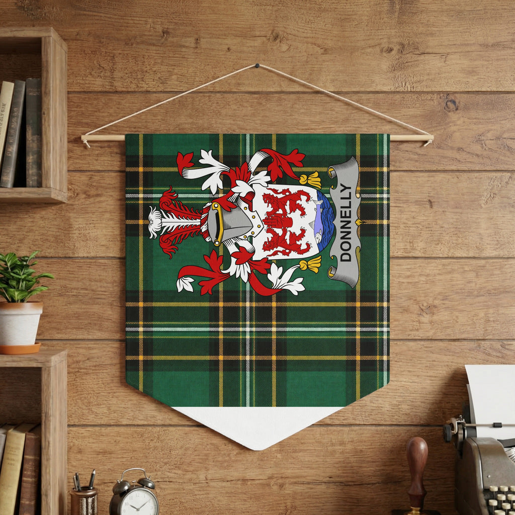Donnelly family crest on green tartan pennant hanging on wooden wall.