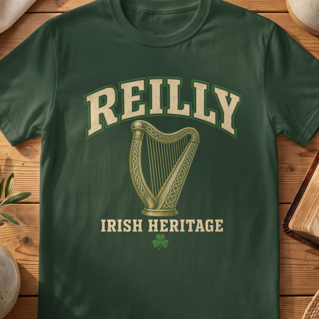 Reilly Irish harp T-shirt in Forest Green, with cream surname lettering, a gold-toned harp, green shamrock and “Irish Heritage” text.