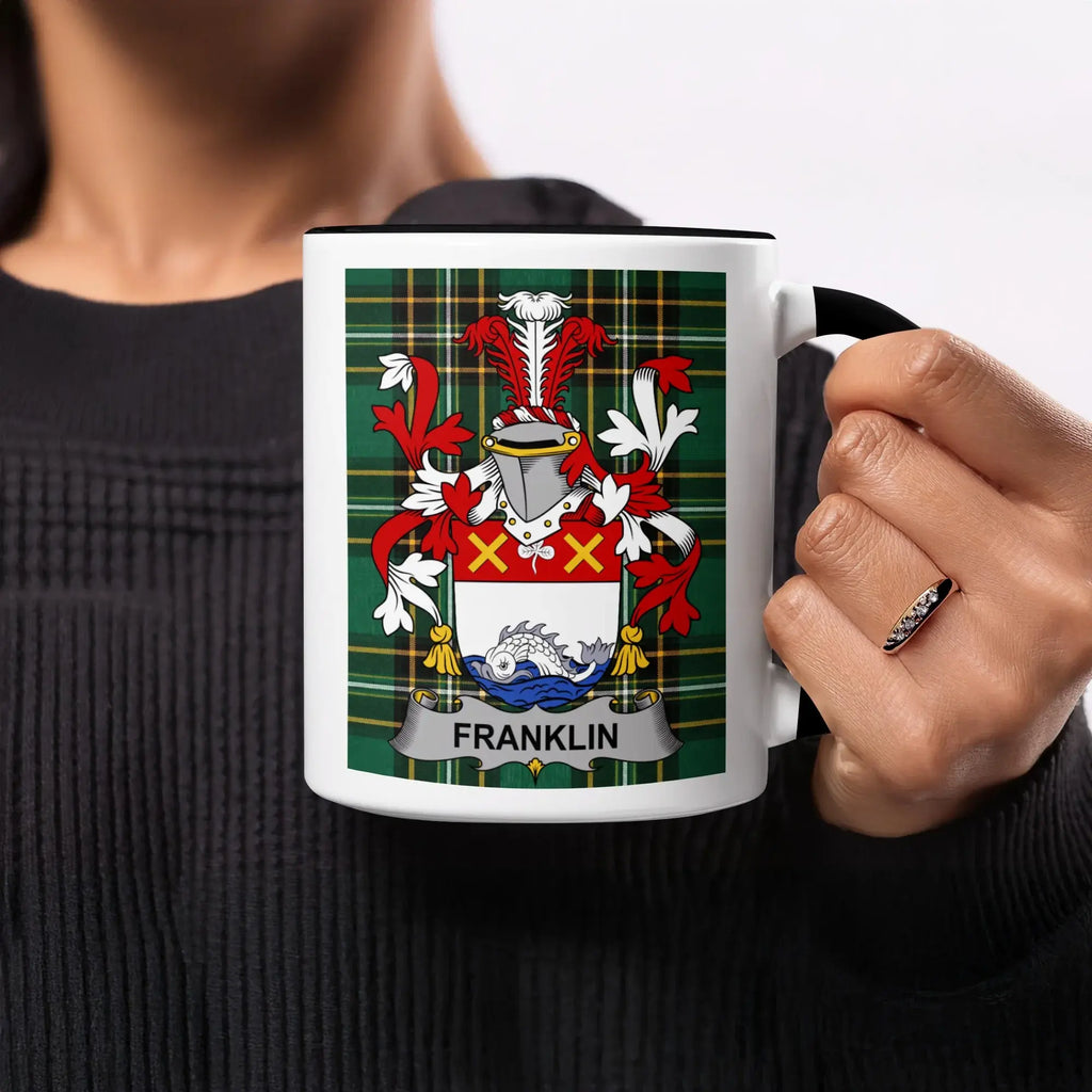 Black and white mug featuring the Franklin family crest on a tartan background.