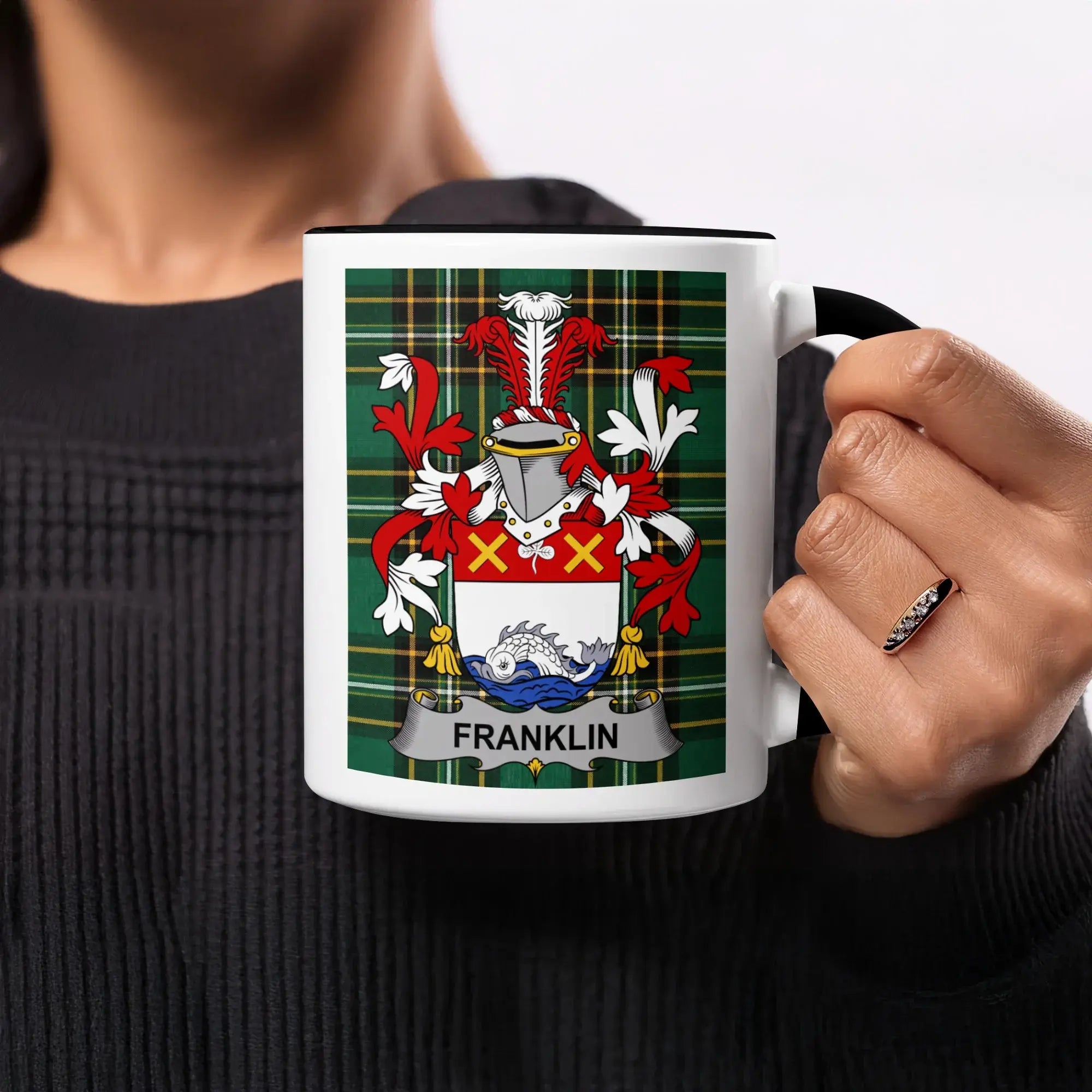 Black and white mug featuring the Franklin family crest on a tartan background.