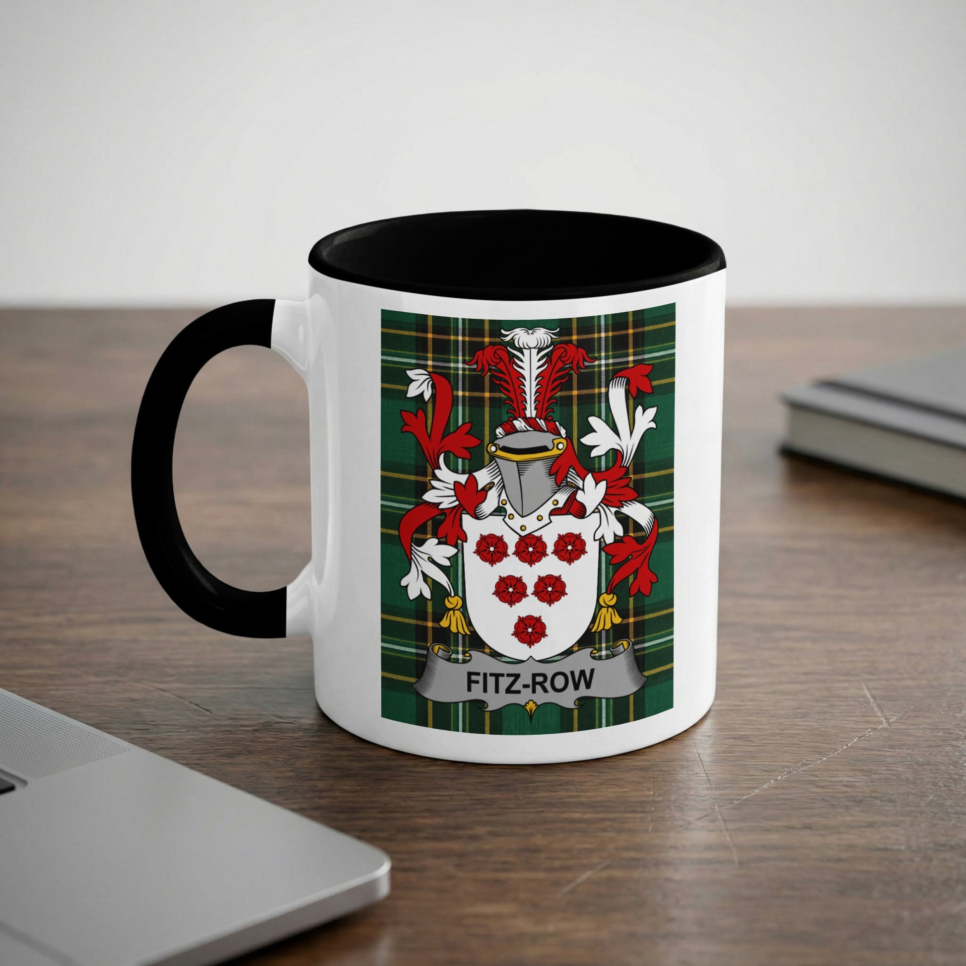 White mug with black rim featuring the Fitz-Row family crest on a tartan background.
