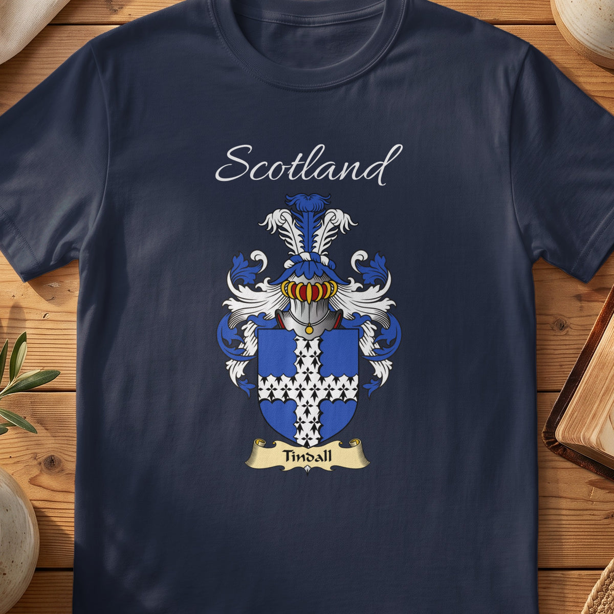 Navy Tindall heritage T-shirt laid flat with “Scotland” and the colourful family shield design.