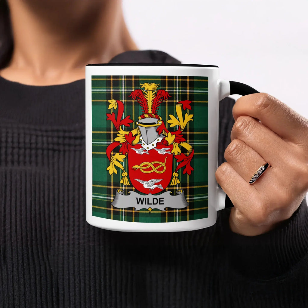 Mug with green plaid background and the Wilde family crest.