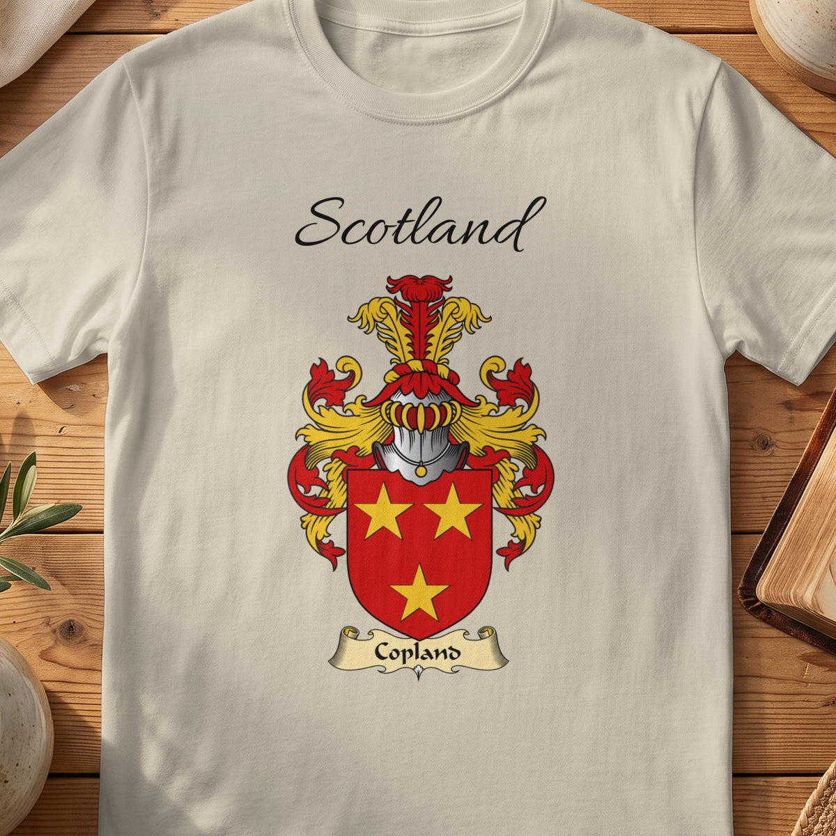 Sand Copland Scottish family shield T-shirt featuring three gold stars on red