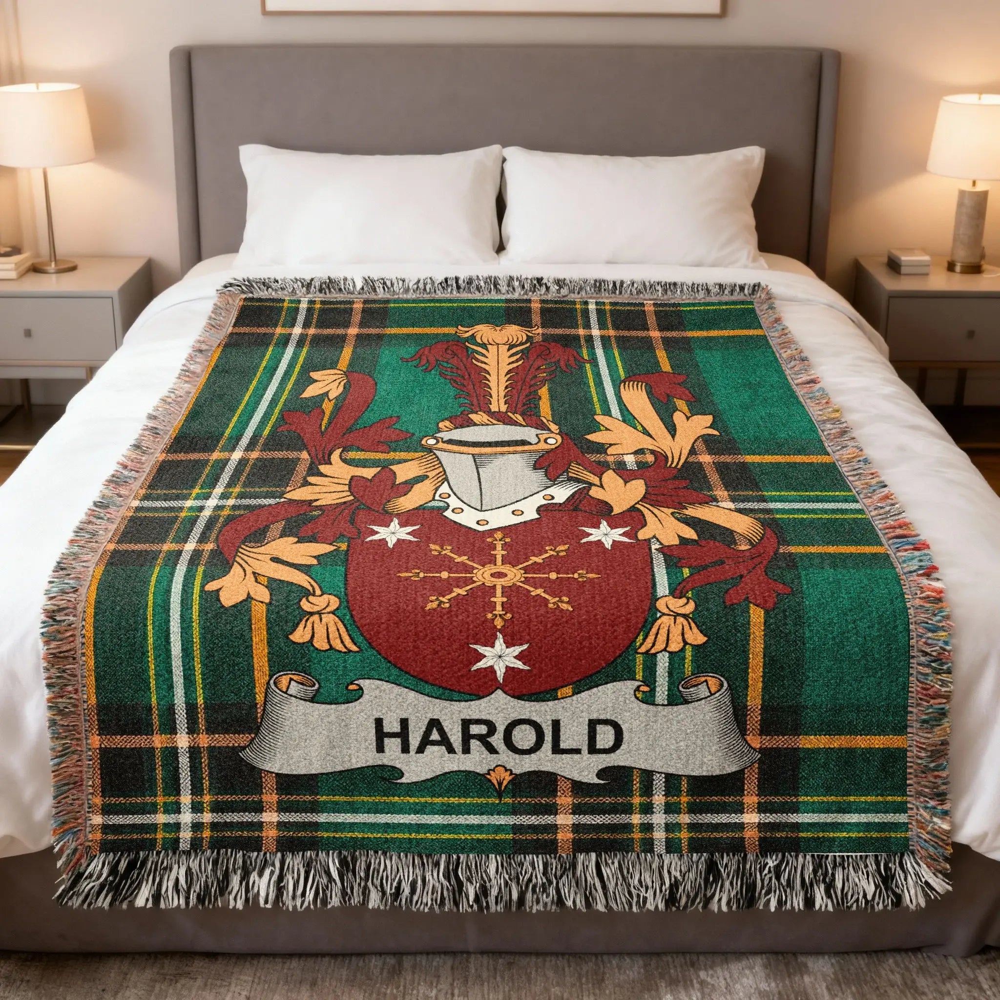 Tartan blanket with Harold family crest and name displayed on a bed.
