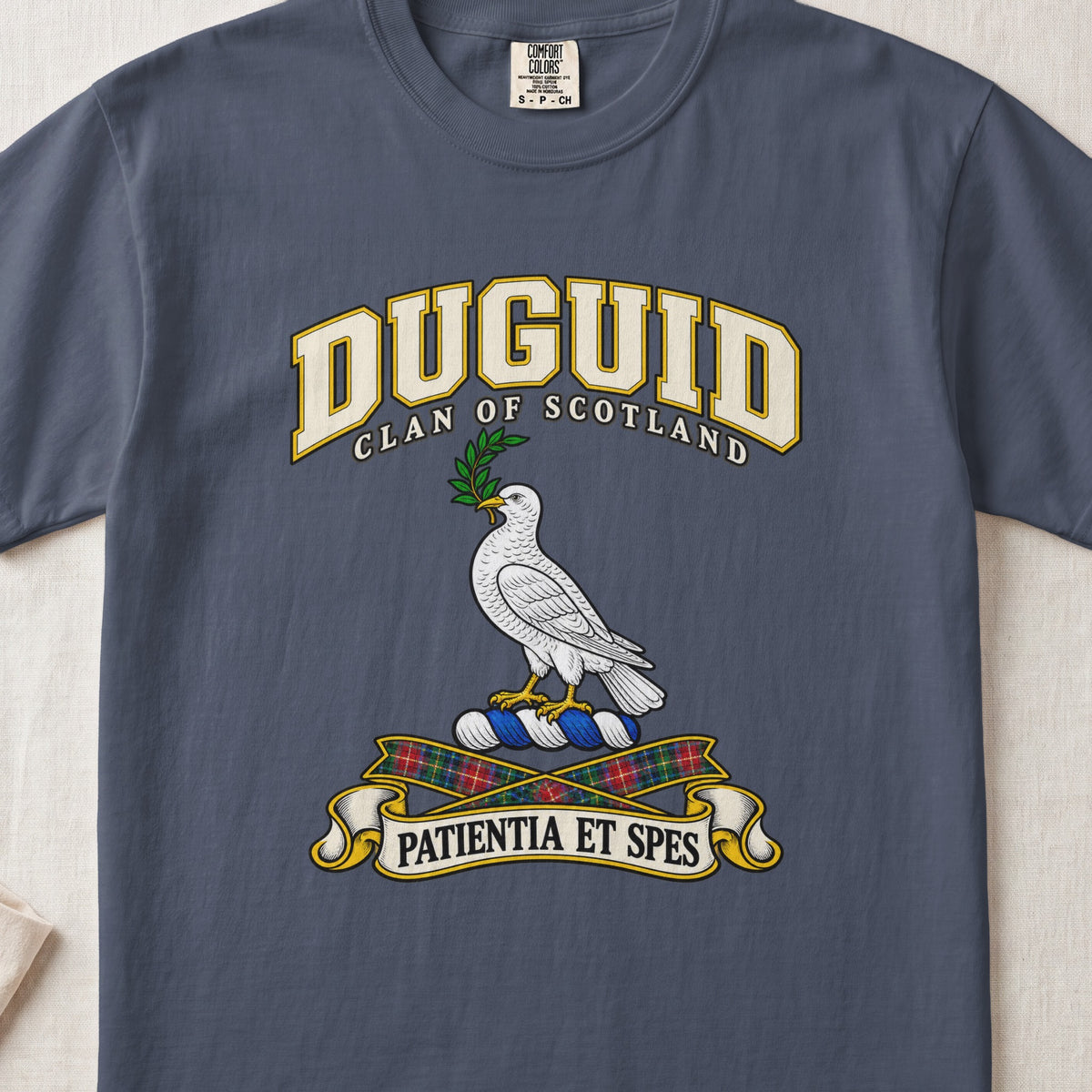 Duguid Scottish clan T-shirt in Midnight, front view with a white dove holding a green branch and motto design.