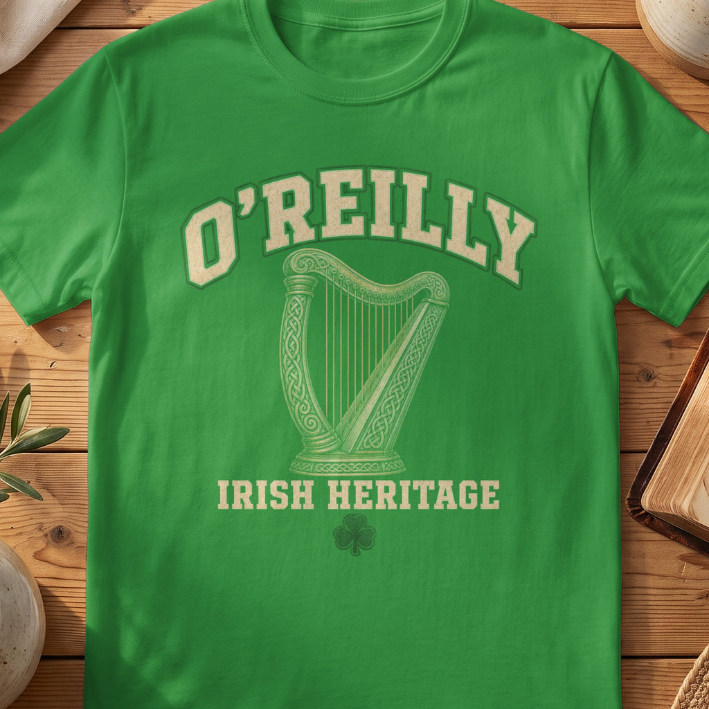 O'Reilly Irish harp T-shirt in Irish Green, with cream surname lettering, a gold-toned harp, green shamrock and “Irish Heritage” text.