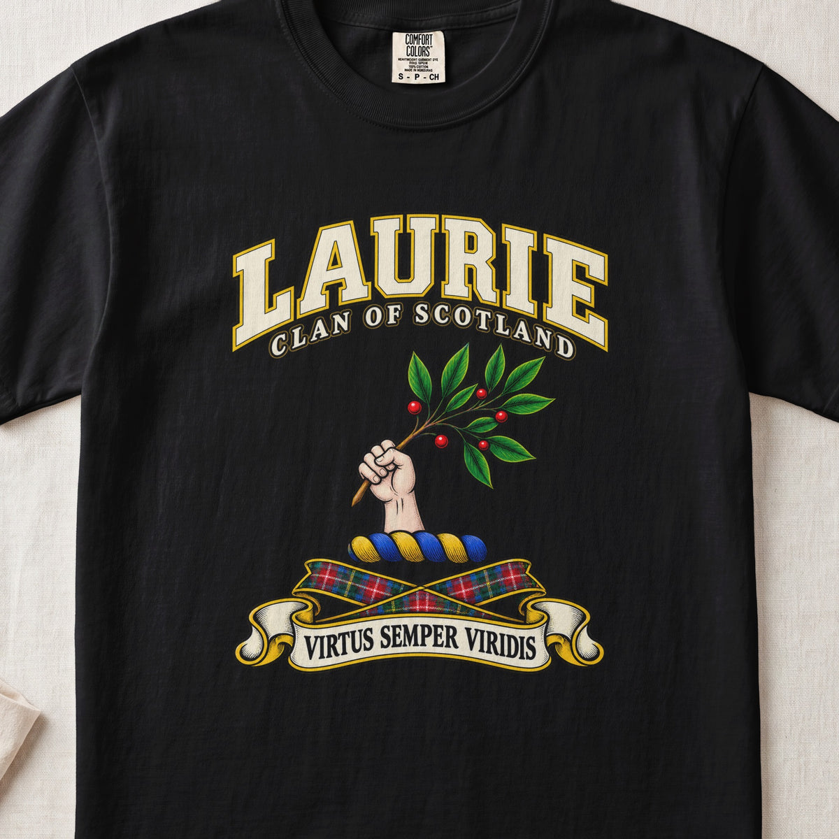 Laurie Scottish clan T-shirt in Black, front view with a hand holding a leafy branch with red berries and motto design.