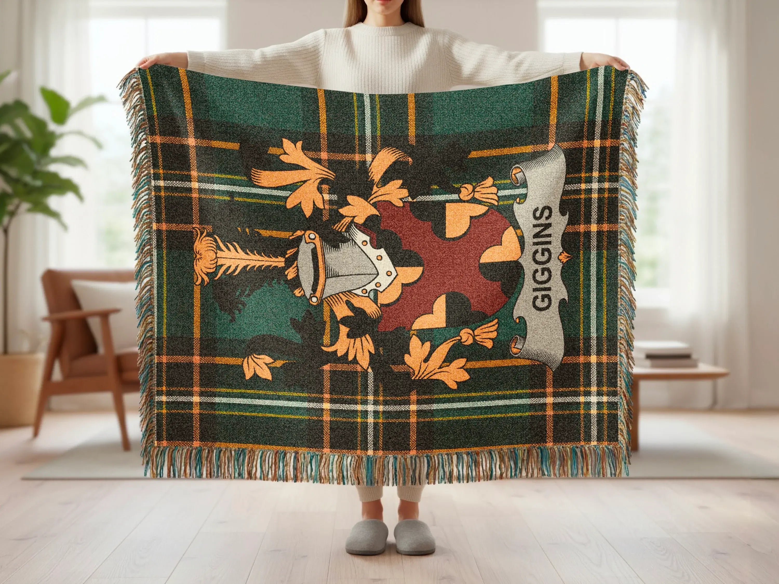 Tartan blanket with the Giggins family crest and shield.
