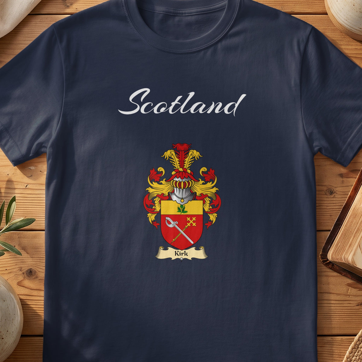 Navy Kirk family shield T-shirt featuring a red-and-gold shield with crossed keys