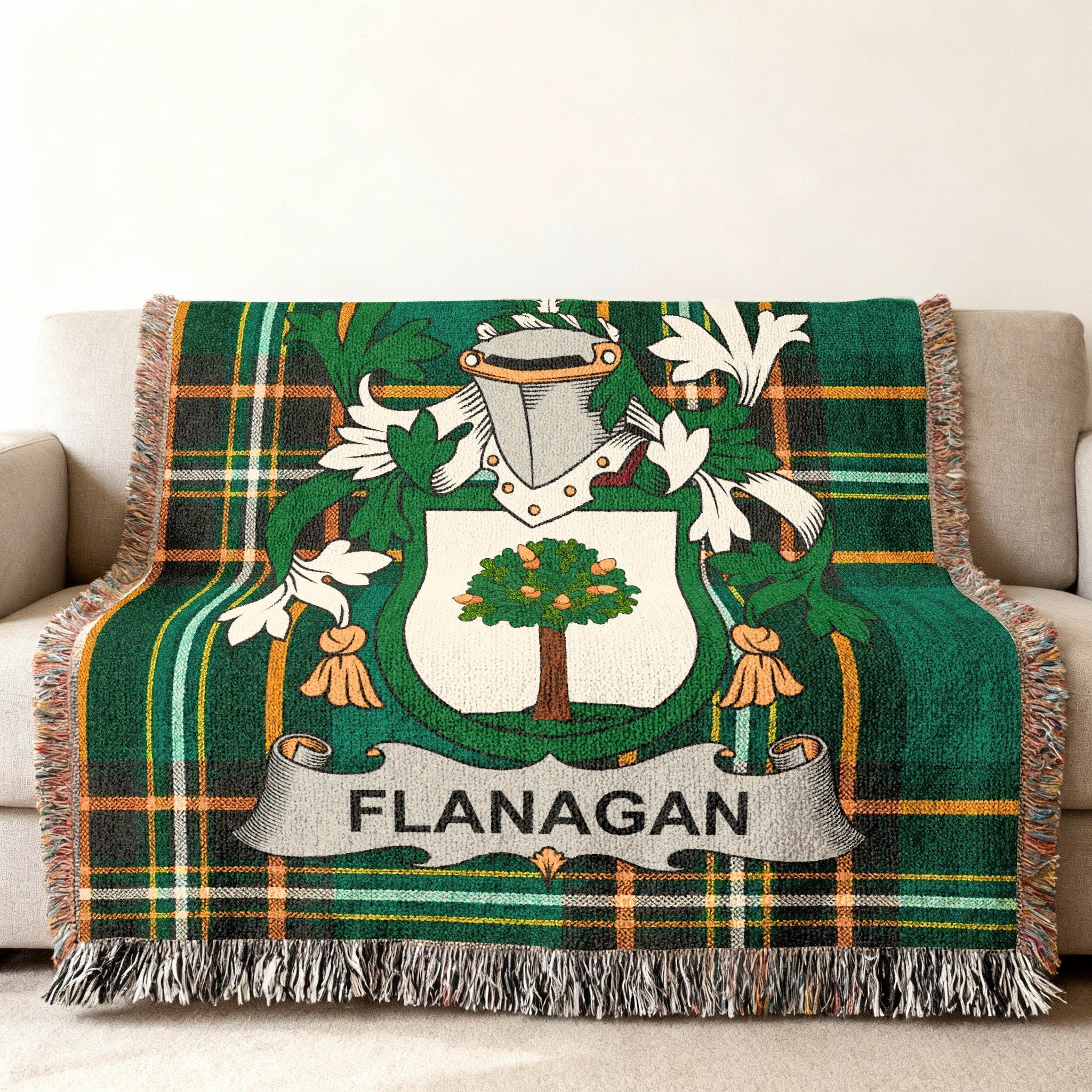 Green tartan blanket with Flanagan family crest.