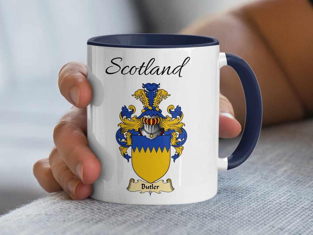 White Butler heritage mug with navy handle and interior, displaying “Scotland” and the colourful family emblem.