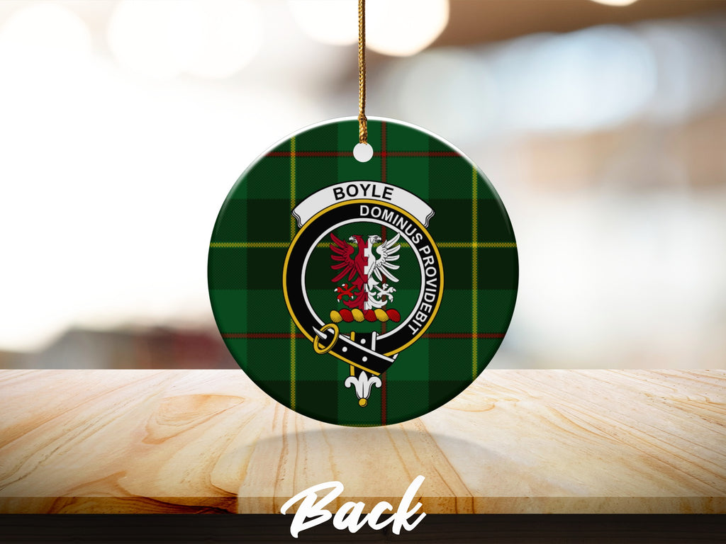 Boyle clan crest tartan ceramic ornament with gold string on wooden surface