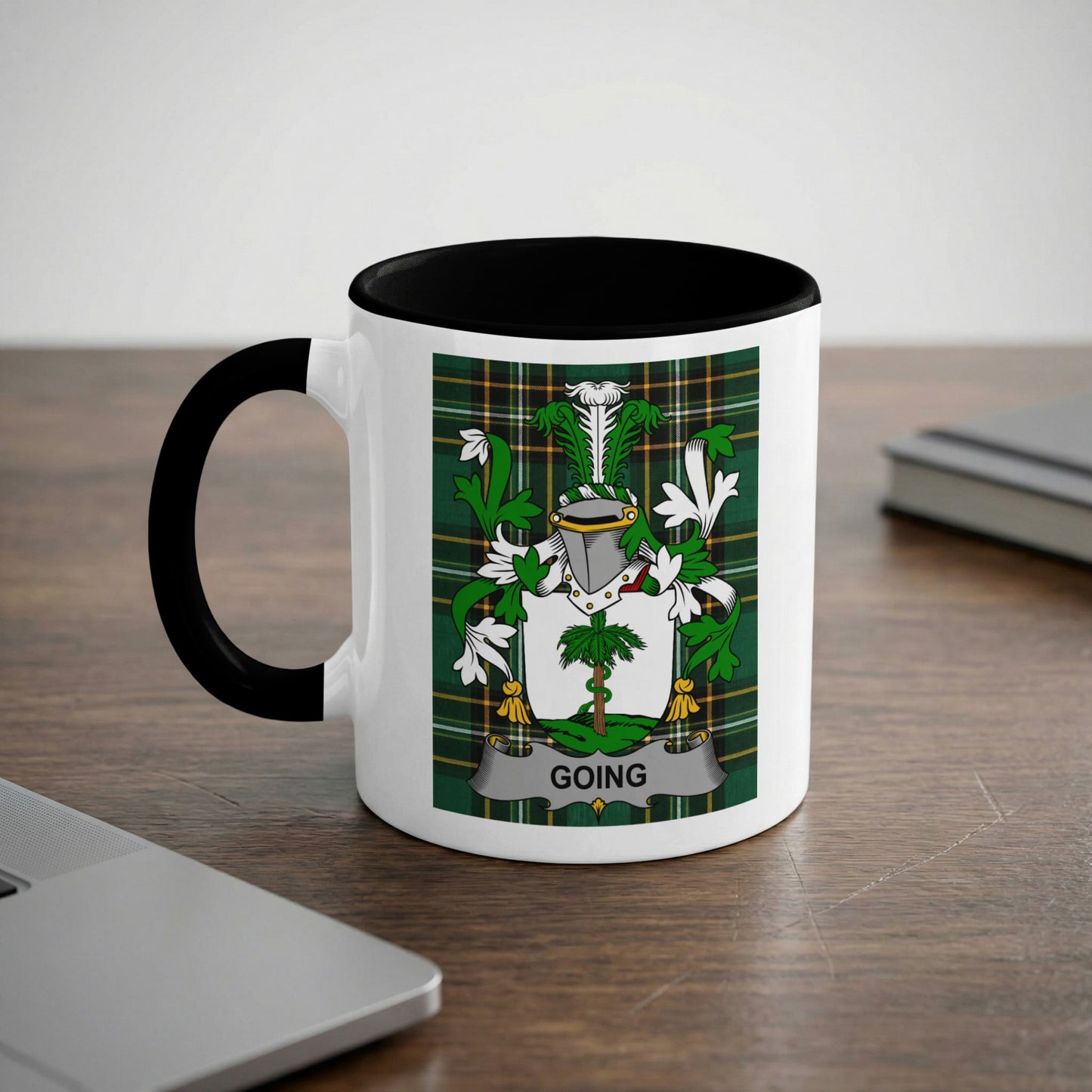 White mug with black rim featuring a green and gold checkered crest with "GOING" written on it.