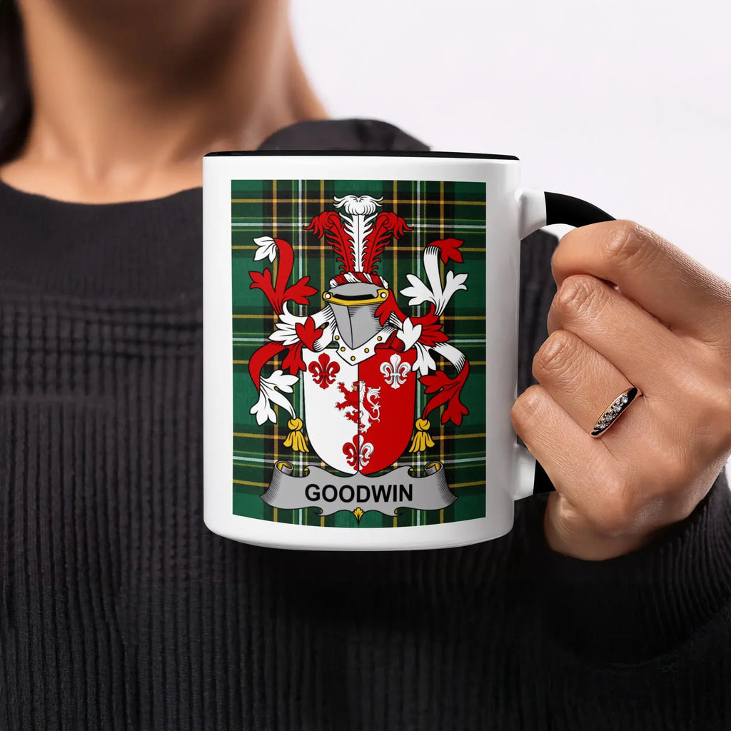 Mug featuring the Goodwin family crest on a tartan background.