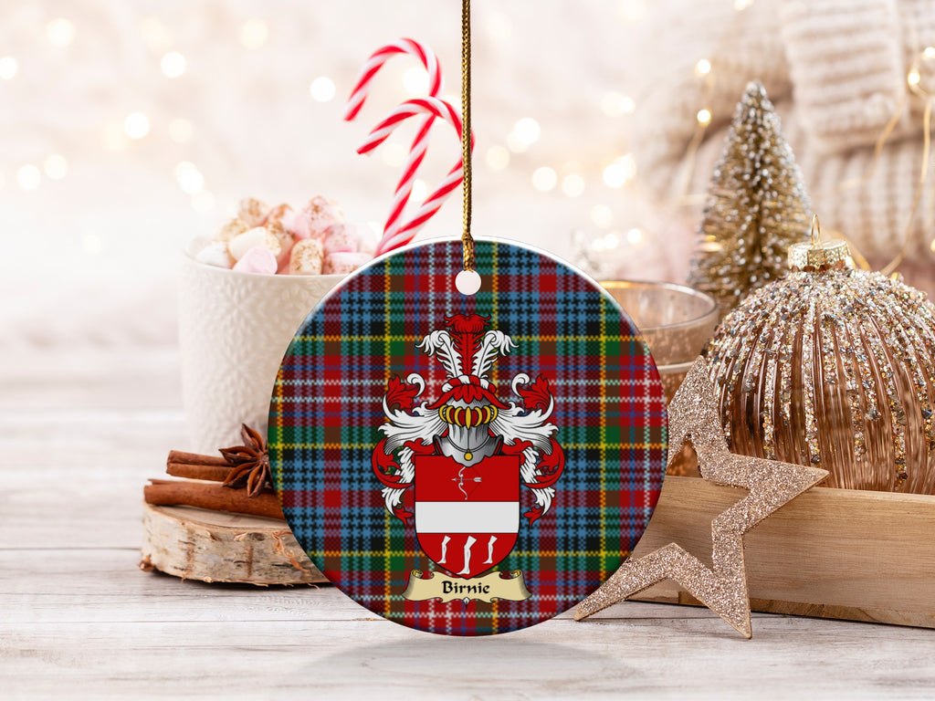 Birnie family emblem ceramic Christmas ornament with Caledonia tartan background in festive holiday décor