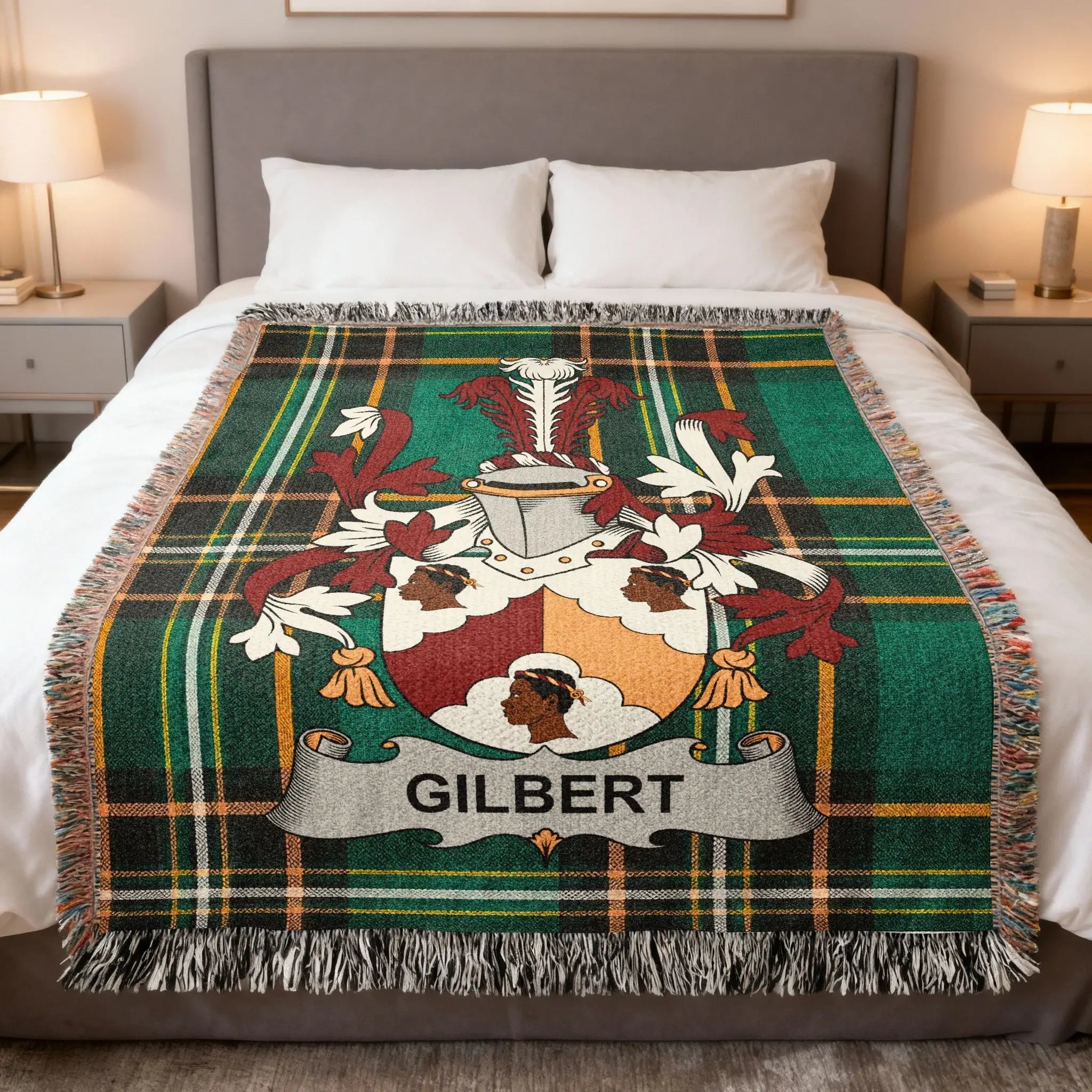 Tartan blanket with a coat of arms displaying the surname "Gilbert".