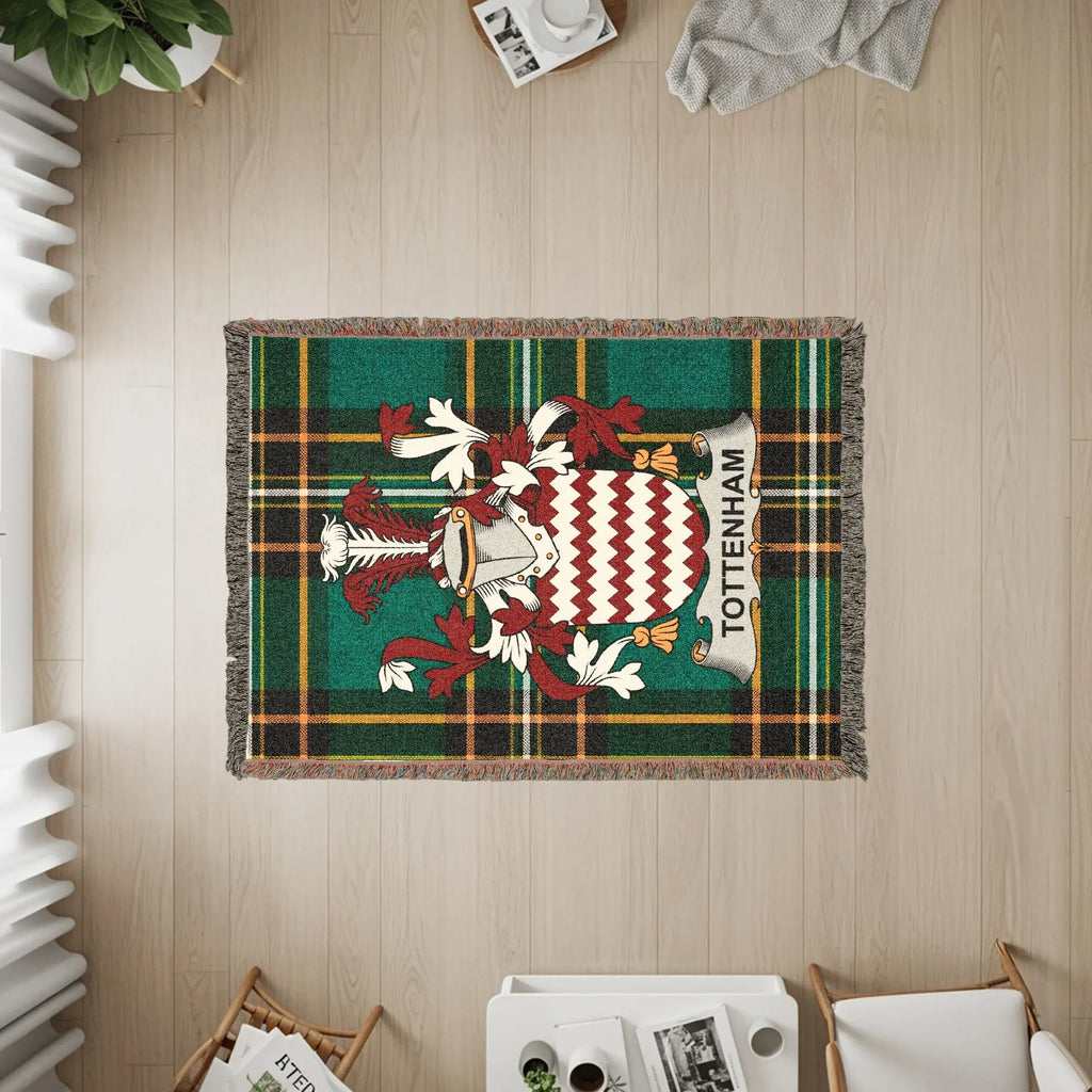 Tottenham tartan throw rug with a crest featuring red and white chevron pattern.