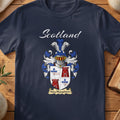 Navy MacNaughton family shield T-shirt featuring a quartered shield with red towers and blue crosses