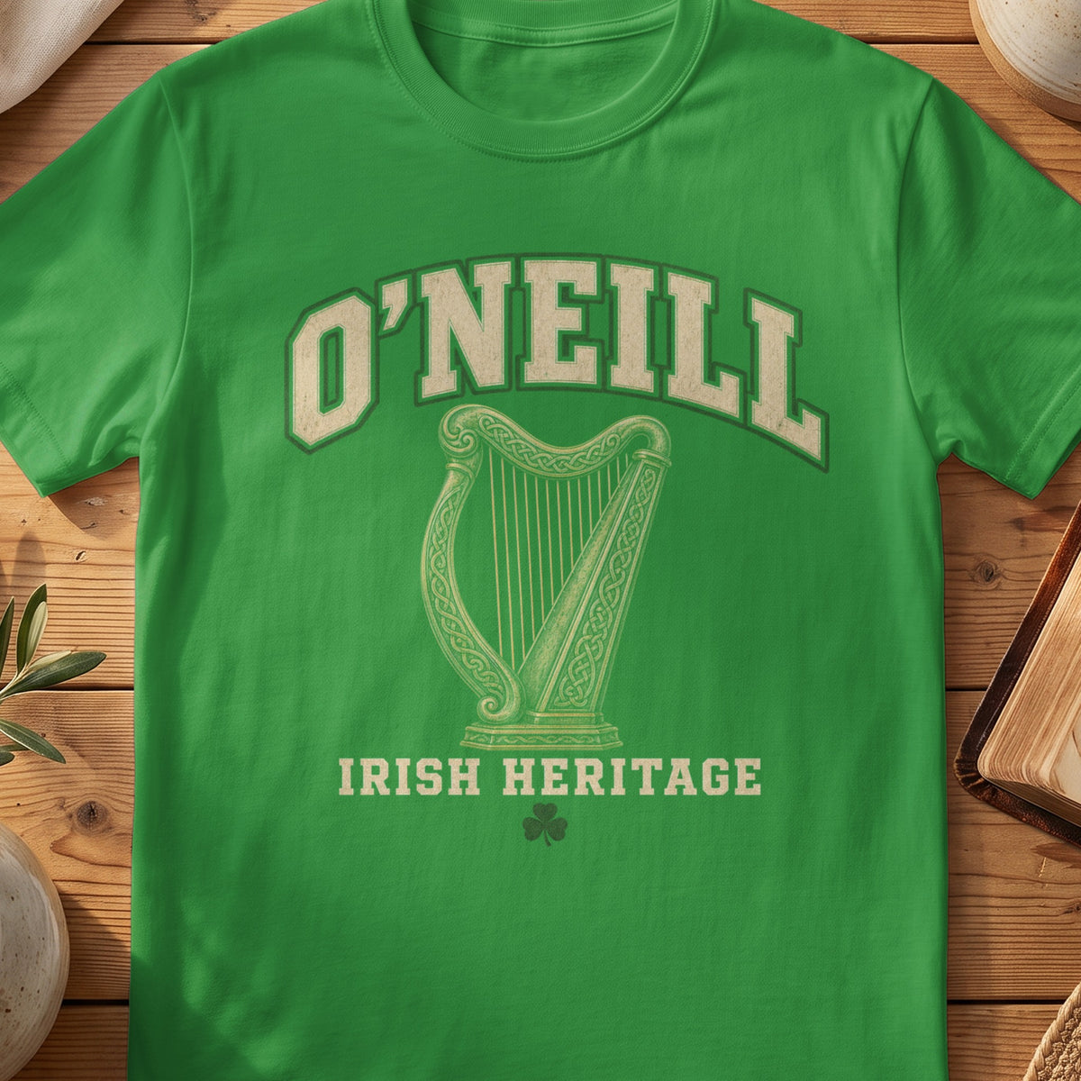 O'Neill Irish harp T-shirt in Irish Green, with cream surname lettering, a gold-toned harp, green shamrock and “Irish Heritage” text.