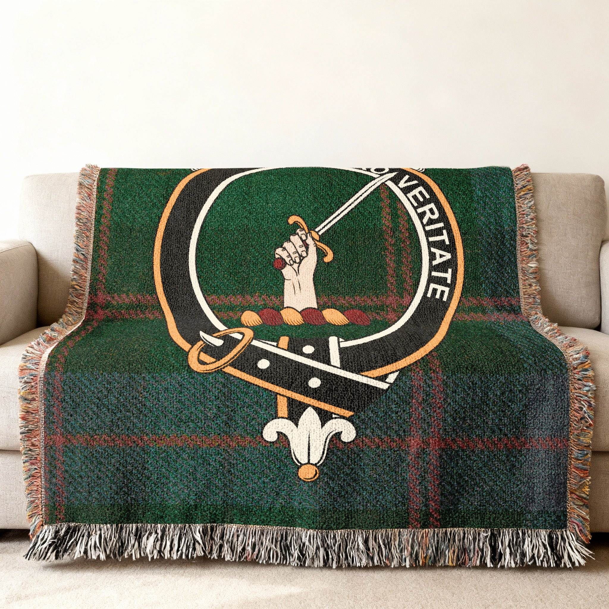 Guthrie clan crest woven blanket — drawn sword design, fringe edge