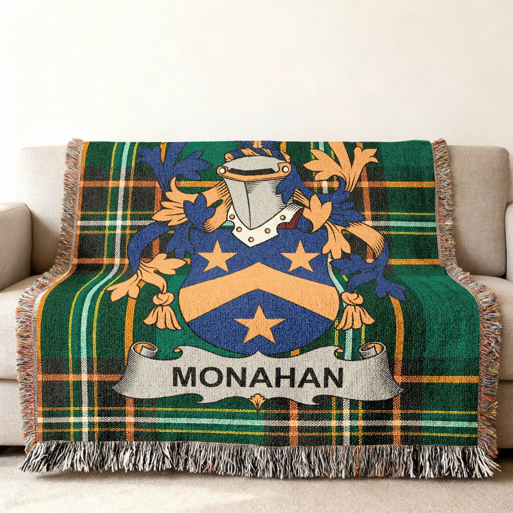 Green tartan woven throw blanket with the Monahan family crest.