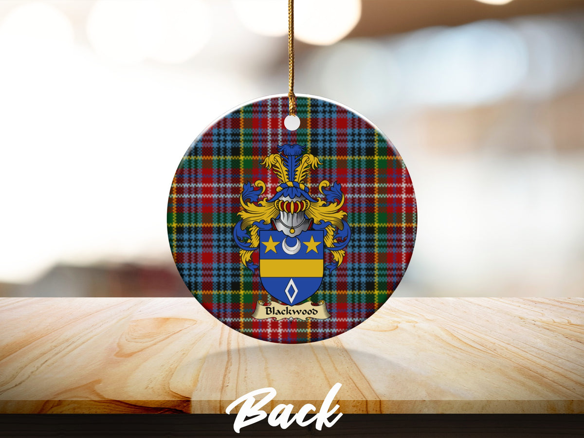 Round Blackwood Scottish clan ornament with family crest on a Caledonia tartan background