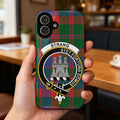Clan Strang stet fortuna domus tartan phone case — glossy edge-to-edge crest print, iPhone shown