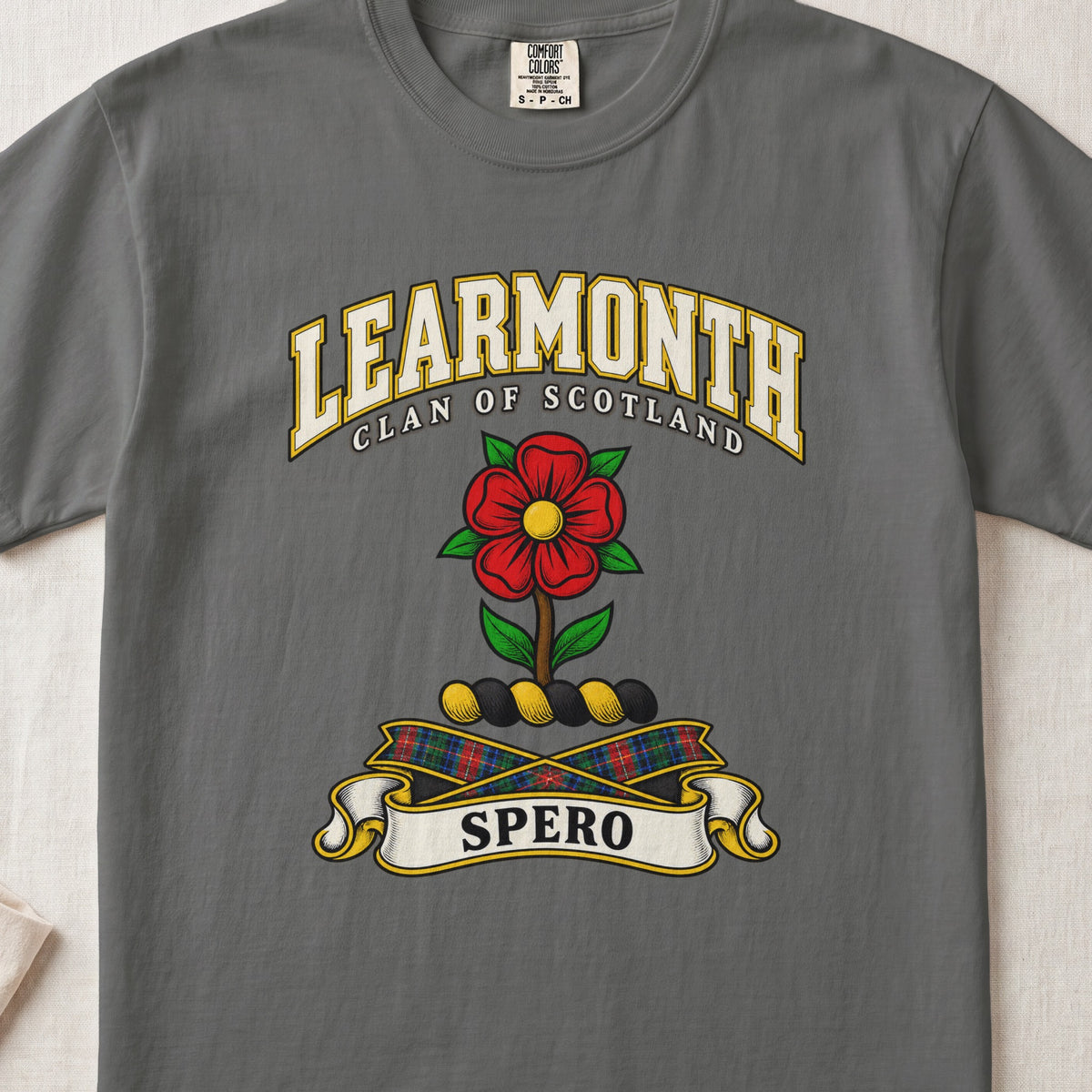 Learmonth Scottish clan T-shirt in Pepper, front view with a red rose with green leaves and motto design.