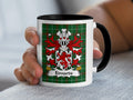Mug with green plaid background, featuring the Edwards family crest and text.