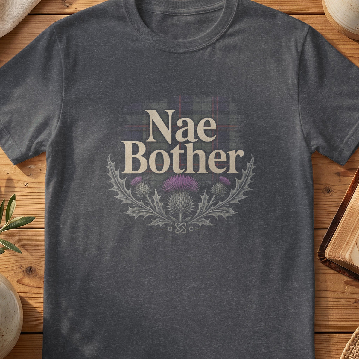 Dark grey Gildan 64000 unisex T-shirt flatlay with Nae Bother Scottish graphic design