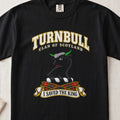 Turnbull Scottish clan T-shirt in Black, front view with a black bull head with green horns and motto banner.