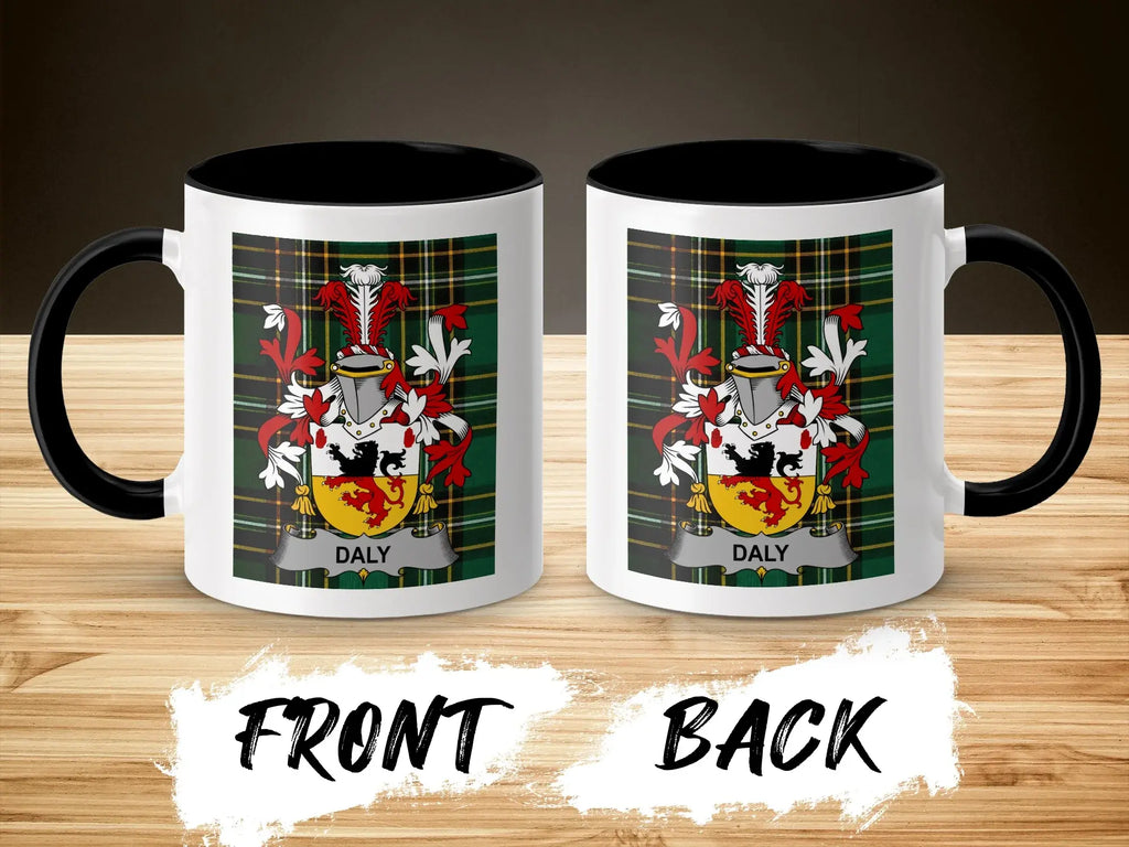 Two white mugs with black handles, each featuring the Daly family crest.
