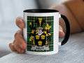 White mug with black rim featuring the coat of arms of the surname Kielty.