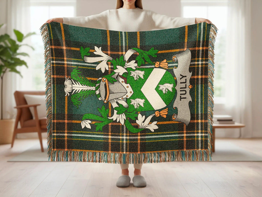 Tully tartan blanket with a family crest featuring a green chevron.
