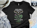 Black t-shirt with Scots-Irish eagle, thistle, and shamrock graphic.