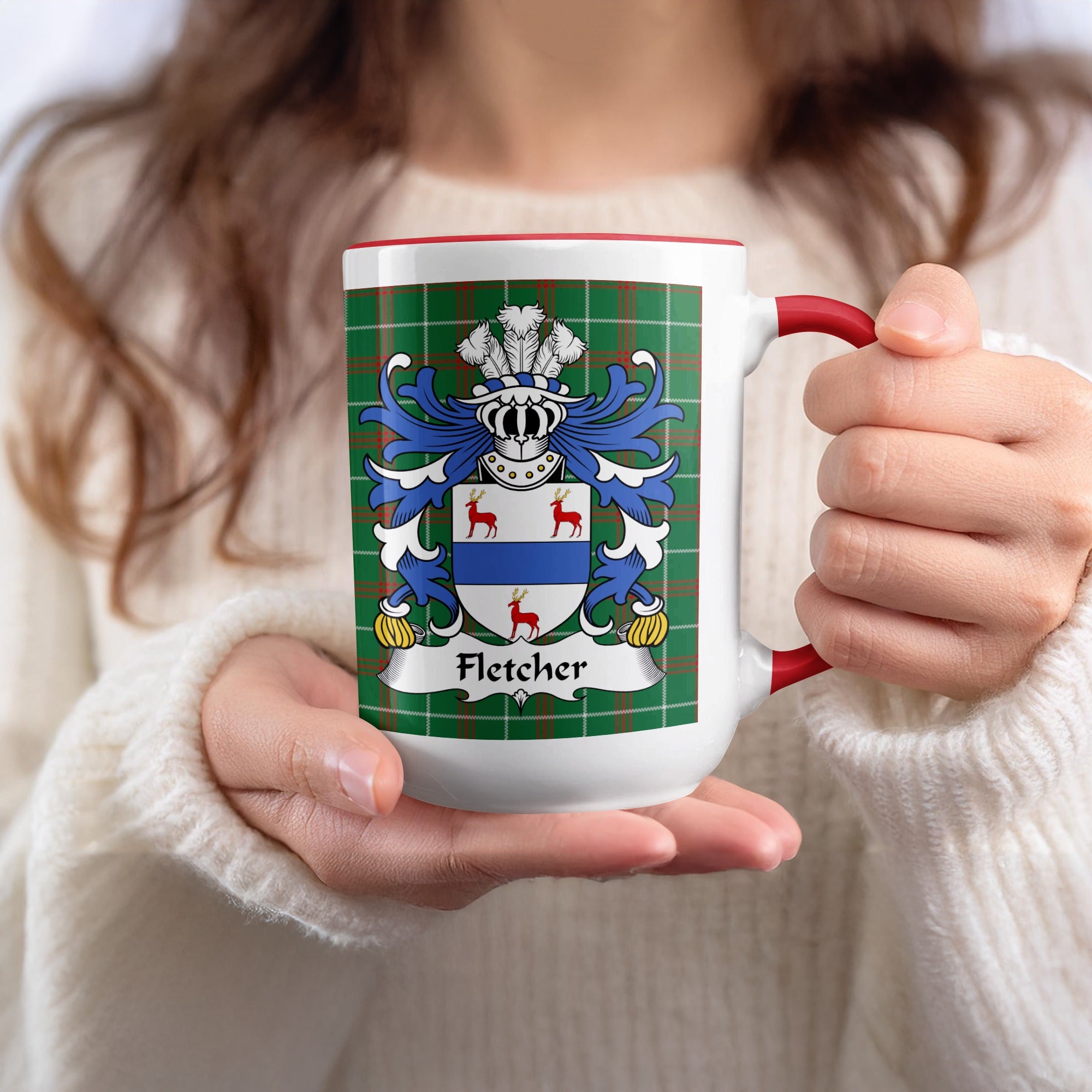 White mug with red trim featuring a family crest with the name Fletcher.