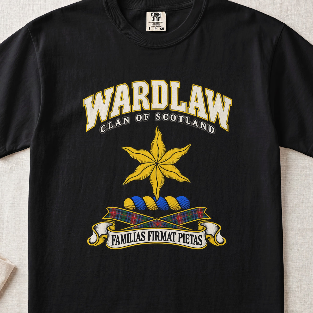 Wardlaw Scottish clan T-shirt in Black, front view with a golden star with wavy points and motto design.