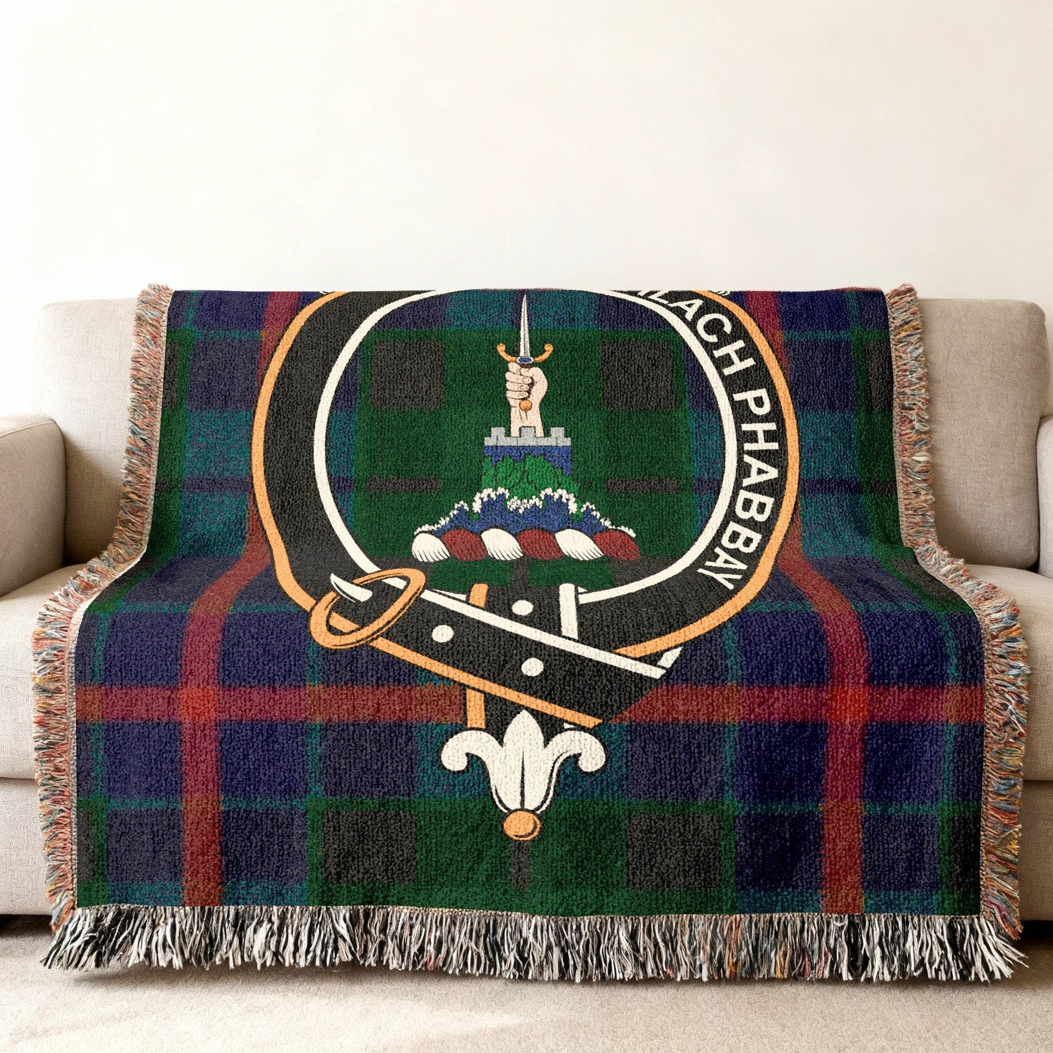 Morrison clan Teaghlach Phabbay tartan woven blanket draped — clan crest on cotton throw